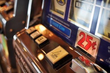 Tarung Mesin slot game interface showing five reels, payline display, and balance information